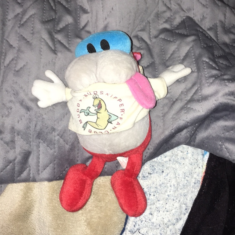 COPY - Stuffed stimpy toy with muddy mud skipper shirt